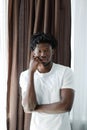 Close-up portrait of young African American man with dreadlocks. Royalty Free Stock Photo