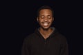 Close up portrait of young man isolated on black studio background Royalty Free Stock Photo