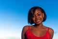 portrait of a young african woman smiling to the camera Royalty Free Stock Photo