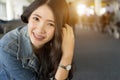 Close up Portrait young Asian woman in airport terminal. Royalty Free Stock Photo