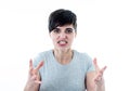 Human expressions and emotions. Desperate young attractive woman with angry face looking furious Royalty Free Stock Photo