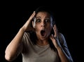 Close up portrait young attractive Latin woman screaming desperate screaming in primal fear emotion Royalty Free Stock Photo