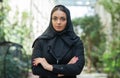 Close-up portrait of young and attractive muslim woman in hijab. Middle Eastern woman outdoor on the street. City Royalty Free Stock Photo