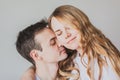 Close up portrait of young attractive romantic couple hugging, being loving with each other Royalty Free Stock Photo