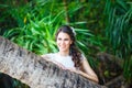 Close-up portrait young beautiful bride in a tropical jungle on Royalty Free Stock Photo