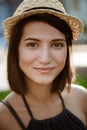 Close up portrait of young beautiful brunette girl smiling. Royalty Free Stock Photo