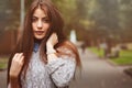 Close up portrait of young beautiful happy girl with well conditioned long dark hair Royalty Free Stock Photo