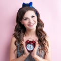 Close-up portrait of young beautiful slim young woman in a retro pin-up style in dress with red sensual lips Royalty Free Stock Photo