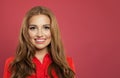 Close up portrait of young beautiful woman smiling. Cute cheerful girl face on pink background with copy space Royalty Free Stock Photo