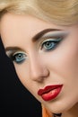 Close-up portrait of young blonde woman with red lips Royalty Free Stock Photo
