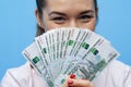 Close-up portrait of young business woman with money cash fan Royalty Free Stock Photo