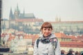Close-up portrait of young caucasian girl tourist looking at camera and smile, Prague Castle Royalty Free Stock Photo