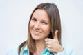 Close up portrait of young cheerful happy smiling business woman showing thumb up. Positive concept Royalty Free Stock Photo