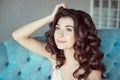 Close up portrait of a young curly girl with medium-brown hair. Royalty Free Stock Photo