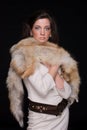 Close up portrait of young fashion woman in fur Royalty Free Stock Photo