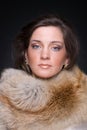 Close up portrait of young fashion woman in fur Royalty Free Stock Photo