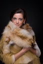 Close up portrait of young fashion woman in fur Royalty Free Stock Photo