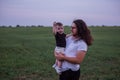 Close up portrait of young father with long hair, beard, glasses holds little son. Fathers day Royalty Free Stock Photo