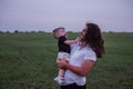 Close up portrait of young father with long hair, beard, glasses holds little son. Fathers day Royalty Free Stock Photo