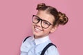 Close-up portrait of a young girl with glasses looking at camera Royalty Free Stock Photo