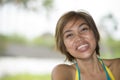 Close up portrait of young happy and beautiful expressive Asian woman laughing excited and nice in positive face expression Royalty Free Stock Photo