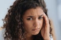 Close up portrait of young lady struggling with headache