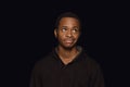 Close up portrait of young man isolated on black studio background Royalty Free Stock Photo