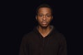 Close up portrait of young man isolated on black studio background Royalty Free Stock Photo