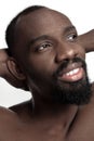Close up portrait of a young naked african man indoors Royalty Free Stock Photo