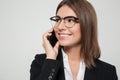 Close up portrait of a young pleased businesswoman