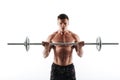 Close-up portrait of young powerful bodybuilder exercising with