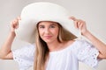 Close up portrait of young pretty girl with white hat Royalty Free Stock Photo