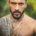 Close up portrait of young sexy man. Handsome guy face. Successful sexy hispanic boy outside. Royalty Free Stock Photo