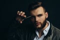 Close up portrait of young sexy man, portrait of guy with barber scissors for barber shop. Modern barbershop, shaving Royalty Free Stock Photo