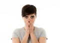 Portrait of Young attractive woman looking scared and shocked covering her face in fear Royalty Free Stock Photo