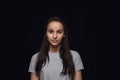 Close up portrait of young woman isolated on black studio background Royalty Free Stock Photo