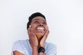 Close up portrait of young woman laughing with hands on face Royalty Free Stock Photo