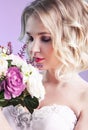 Close up portrait of yuong beautiful bride with flowers over pin