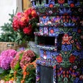 Close up of post box covered in Liberty print, located in the flower shop outside Liberty of London store.