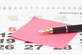 Close up of Post-It Note on Calendar Royalty Free Stock Photo