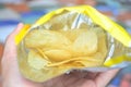 Close up potato chips in opened bag Royalty Free Stock Photo