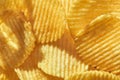 Close up potato chips top view food background. Royalty Free Stock Photo