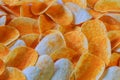 Close up potato chips wood top view background.