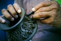 Close up potter artist working on clay pottery sculpture fine art in thailand