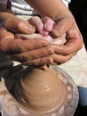 Close-up of potter and child hands making pottery Royalty Free Stock Photo