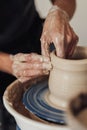 Close Up of Pottery Artist at Work, Potter Master Creating Clay Pot on a Wheel Royalty Free Stock Photo