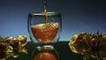 Close up of pouring apple juice into the glass standing on glass surface table. Stock clip. Berries on the table