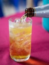 Close-up of pouring beer into glass on table Royalty Free Stock Photo