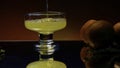 Close up of pouring orange soda into the glass. Stock clop. Soft drink with the taste of citrus and orange fruits on the Royalty Free Stock Photo