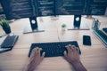 Close up pov programmer working typing keyboard coding screen monitor computer web development debugging inside office Royalty Free Stock Photo